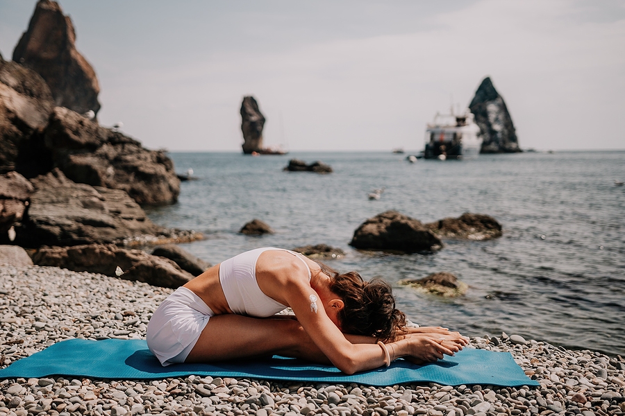 woman doing yoga for mental well being