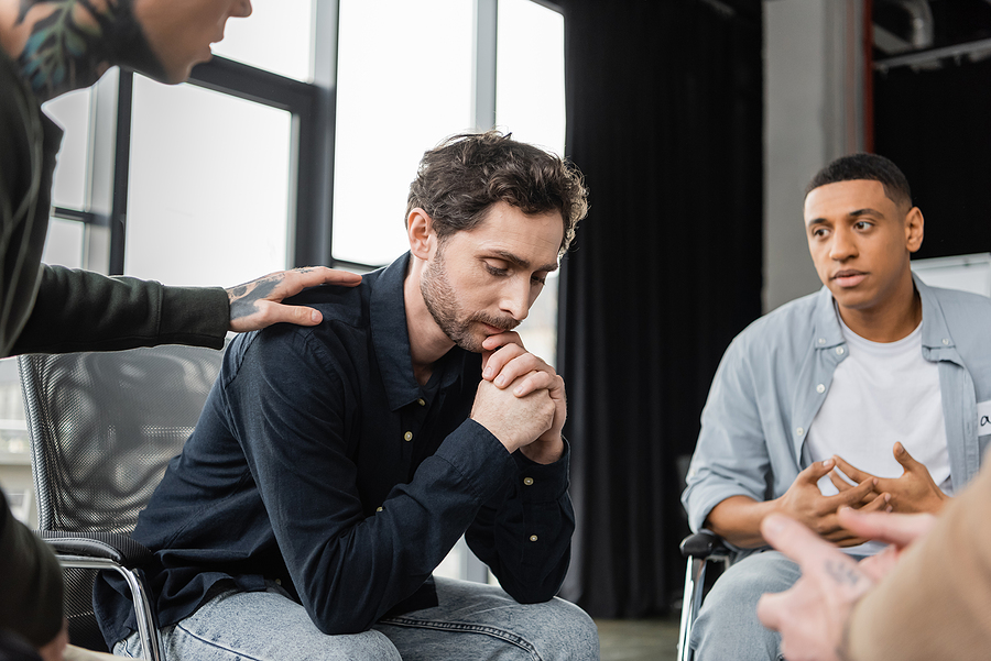 man struggling with cocaine addiction attending cocaine recovery programs